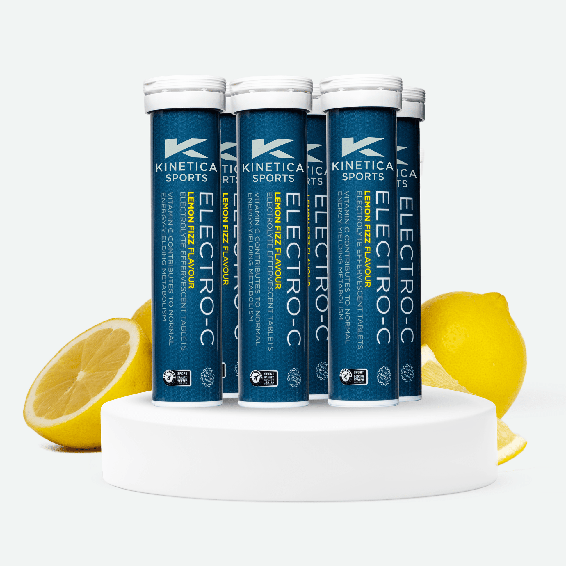6 Kinetica Sports Electro-C tubes with lemon slices on a light green background